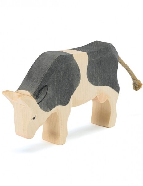 Kuh - schwarz - fressend